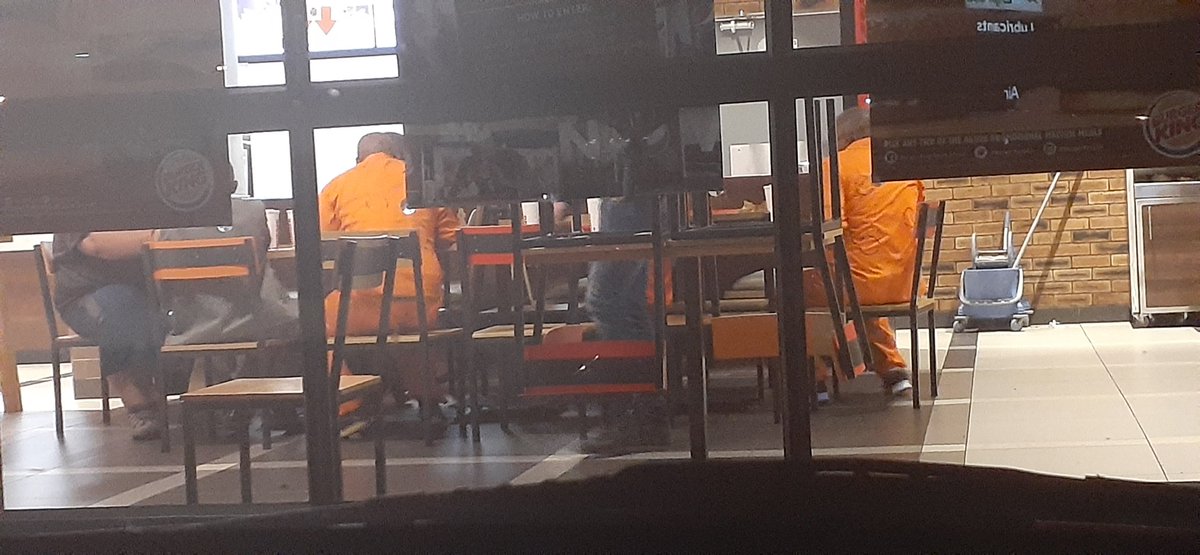 shaqem's tweet photo. @Abramjee @DOJCD_ZA @RonaldLamola I posted this recently, and nobody seems to care, these are prisoners eating at Burger King  Bloemfontein  Sunday 8 March.......and people were being subjected to rude slurs https://t.co/kbxEVWgOs4