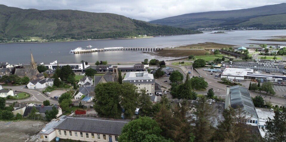 Fort William pier with the Imperial Hotel and St Andrews Church in foreground. Bit of a grey day but better weather on the way ⁦<a href="/VisitScotland/">VisitScotland</a>⁩