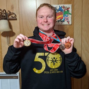SpecOlympicsNY's tweet photo. Congratulations to #SpecialOlympicsNY athlete Jacob Booher-Babcock on winning his first gold medal at Winter Games! Read more about his success in this article: https://t.co/oKwB4JCri6. #SONY50 https://t.co/2iR4kMKHgg