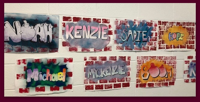 Art students created "street art" after studying the work of Banksy and his social messages.