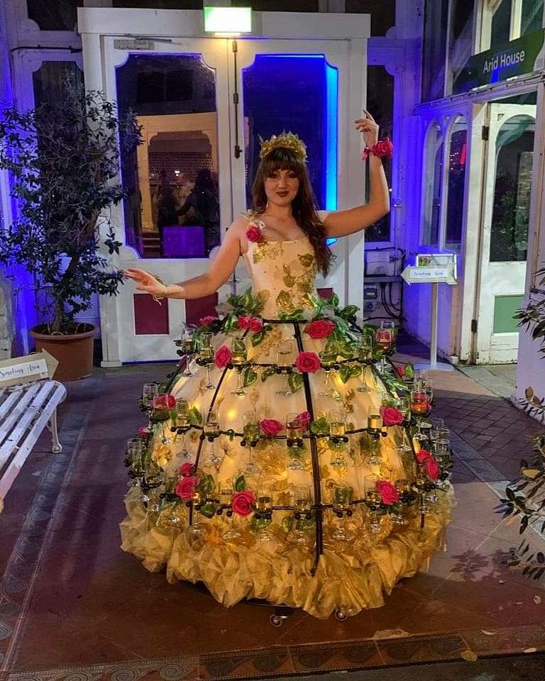A champagne skirt is a great way to greet your guests and this was the perfect outfit to be worn at the Birmingham Botanical Gardens last night. #flambecircus #corporateevents #champagneskirt