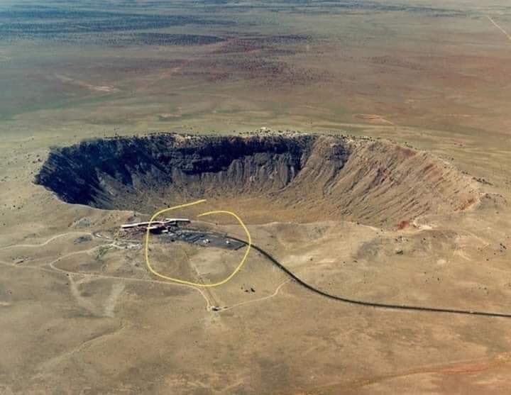 ComedyGee's tweet image. This is a picture of an asteroid crater in Arizona - Look how close it came to hitting the visitors centre!