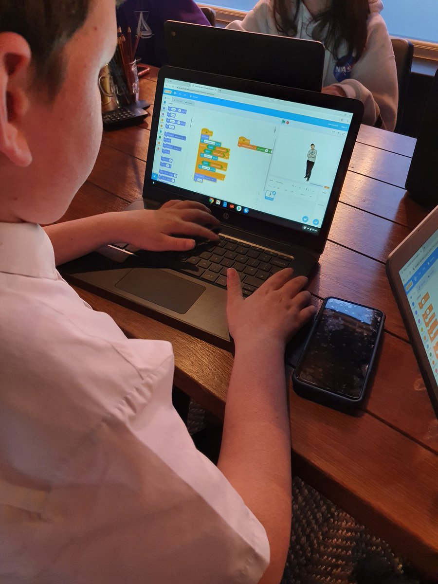 ClacksCLD's tweet photo. Look at the concentration on the faces of our code club #digiwizards all helping each other π€© Creating their own random question game #clackscodeclub #clackscld #clddigitalthursday you could hear a pin drop in here https://t.co/LZLBxCMjT7