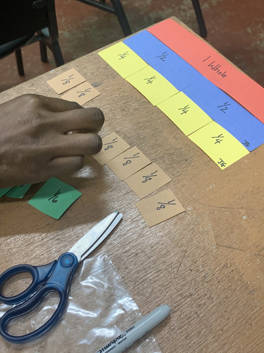 Jo_Dupe's tweet photo. I traveled from @AthensCitySD in Ohio to Jamaica to provide professional development to teachers in mathematics. Today we made @mburnsmath fraction kits! #AthensBulldogs #matharoundtheworld #fractions https://t.co/7NWpuDiRFX