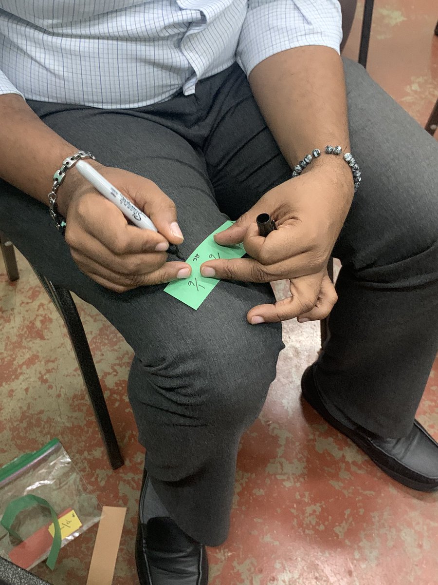 Jo_Dupe's tweet photo. I traveled from @AthensCitySD in Ohio to Jamaica to provide professional development to teachers in mathematics. Today we made @mburnsmath fraction kits! #AthensBulldogs #matharoundtheworld #fractions https://t.co/7NWpuDiRFX