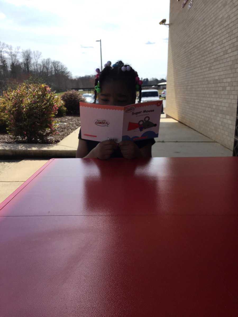 Reading outside on this beautiful day! #readacrossoverton <a href="/OES_Explorers/">Overton Elementary</a>