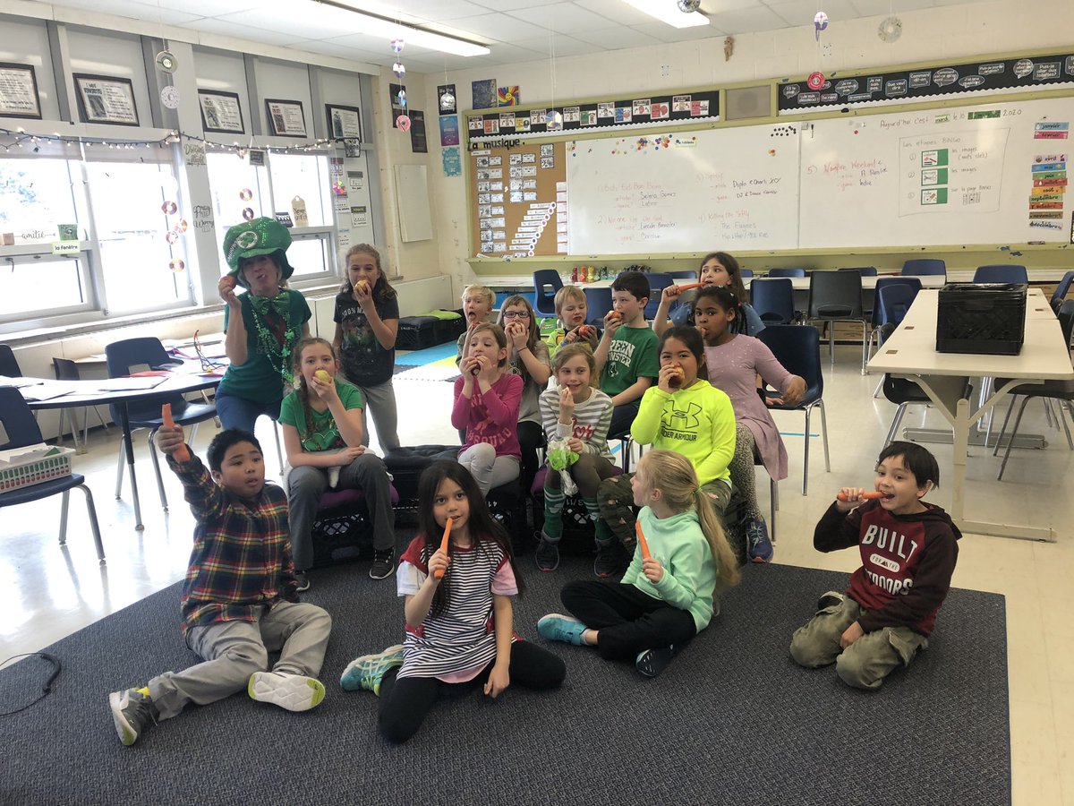 GemmitiFolz's tweet photo. What a fun day @StMikeCobourg with the Big Crunch - eating apples and carrots as a healthy snack and celebrating green for St. Patrick’s Day and Kidney Awareness. Our student council raised $90 to give to the Kidney Association. #pvncfun #pvncserves #StMikeCES https://t.co/WvD57YNaY0