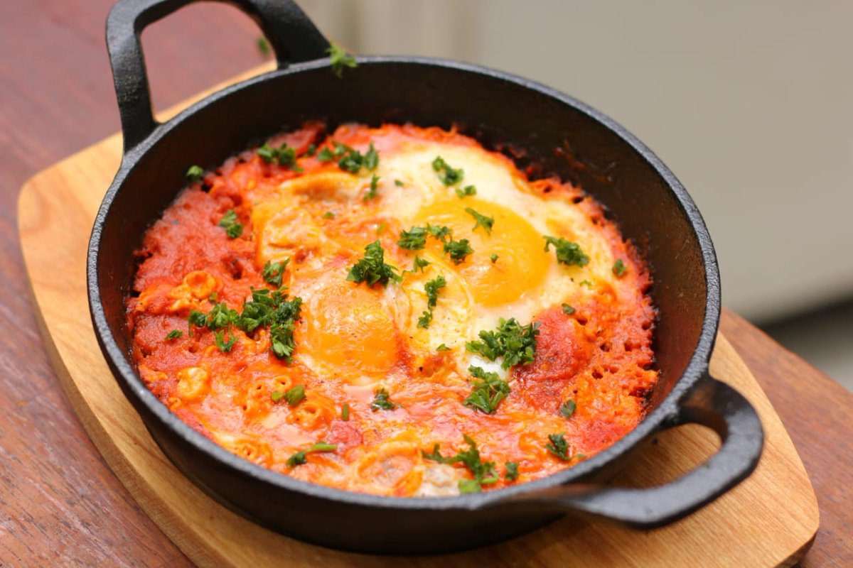qaffeepoint's tweet photo. If you don't know what Shakshuka is, you don't know what you've been missing!π
β’
β’
We're open daily from 7am to 11pm! Ralli House, Ground Floor!
#qaffeepoint #restaurant #mombasa #breakfast #shakshuka #sumptious https://t.co/bNGSouFOiS