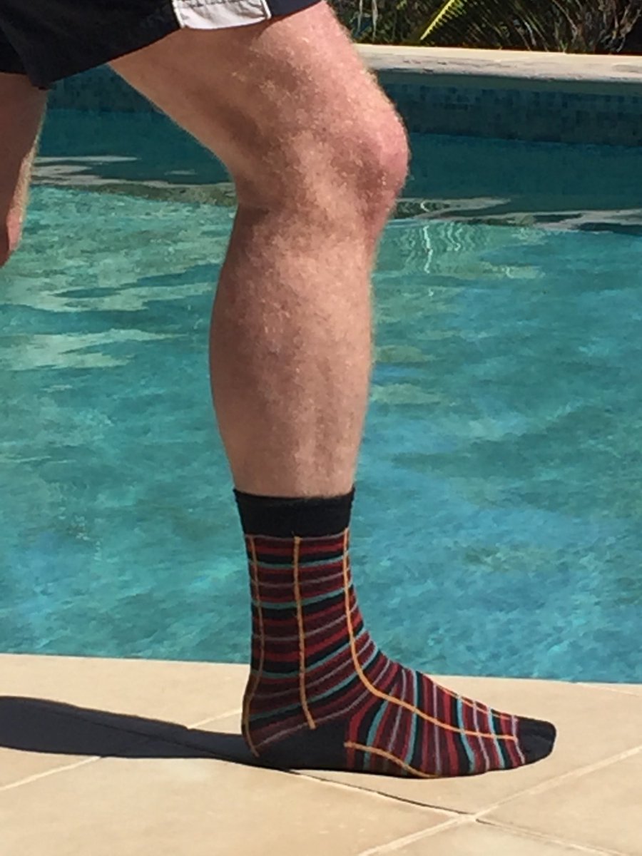 Sam462's tweet photo. A token appearance of #moquettesocks by the pool in Greneda - it was far too hot for socks all week! https://t.co/pVTgWmDuvU