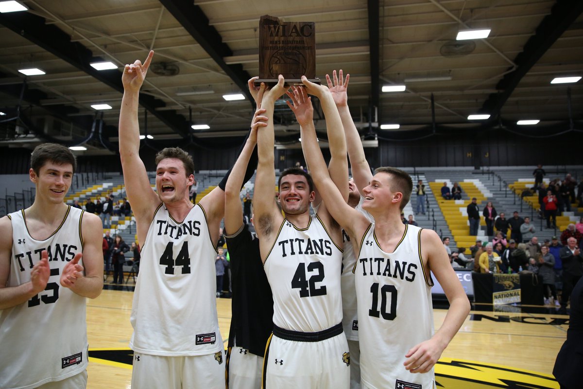 UWOshkoshTitans's tweet photo. All smiles tonight for defending national champion &amp; 2018 runner-up @UWOMBB after clinching its 5th straight NCAA postseason berth.

UWO earned the 4th WIAC Championship title in program history &amp; 1st since 2016.

#HailTitans 🏆💛🖤 https://t.co/9eBeA1PTTT