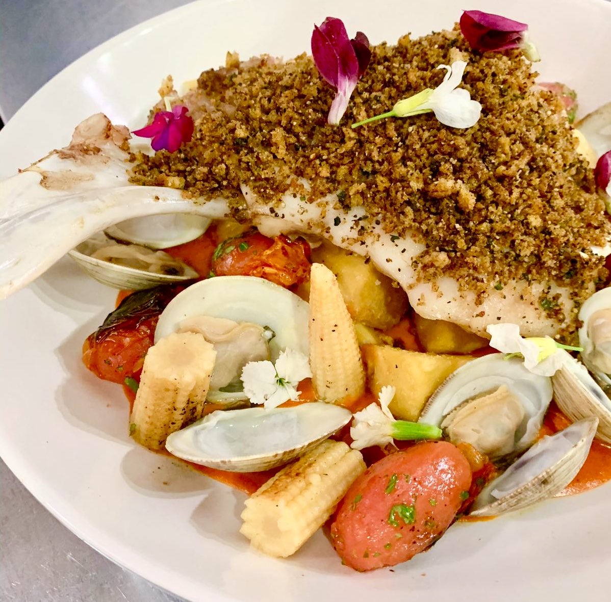 More deliciously edible food art. 
Daily specials that make you want to eat at <a href="/catchcayman/">Catch Cayman</a> every day. 

Grouper tomahawk, crusted with mix spiced and pepper, steam clams, cherry tomatoes, baby corn and creamy piquillo pepper sauce.