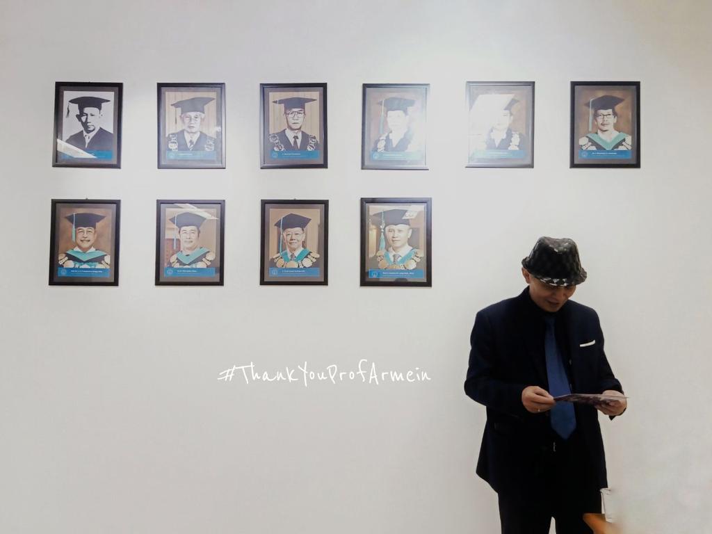 Among legends on the wall of honors