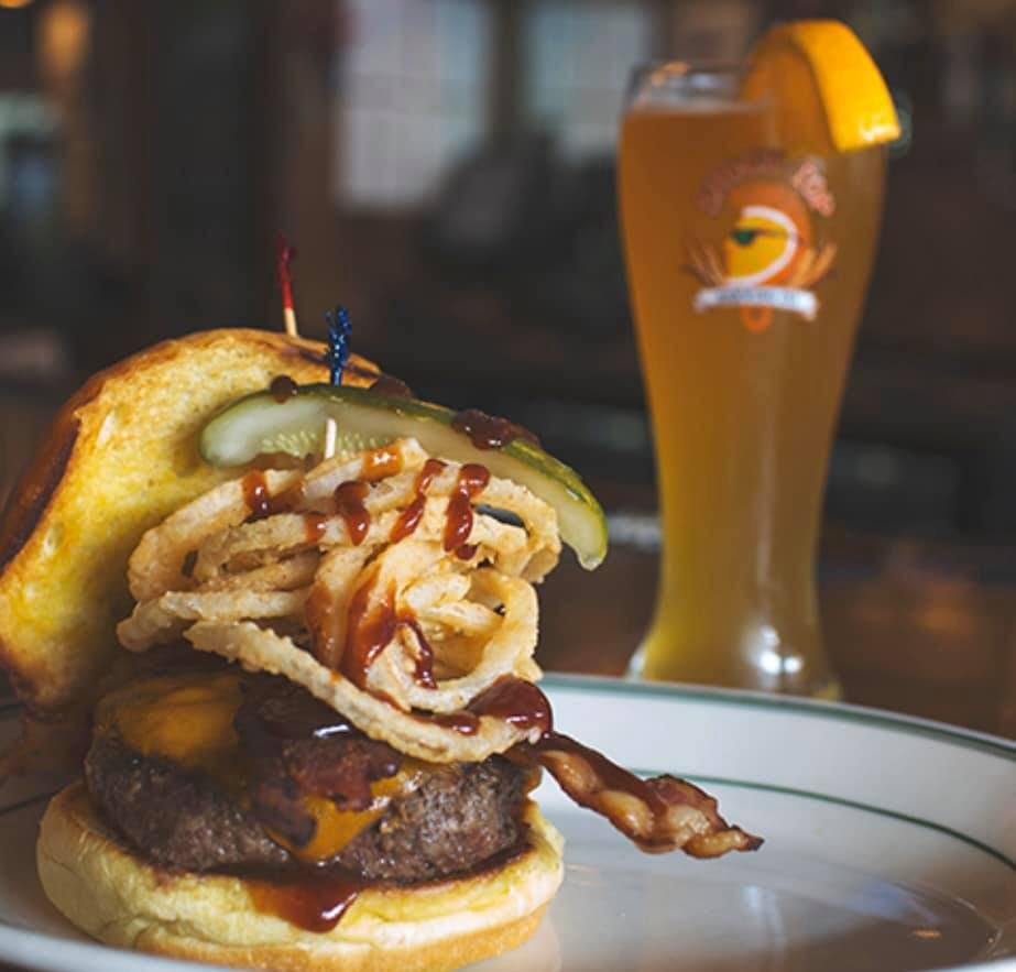 All of our half-pound burgers are carefully built with fresh ingredients for spectacular flavor combinations—like this BBQ Bacon Burger. 🤤🥓 🍔 Come get yours and wash it down with one of our tasty brews today! 🍻