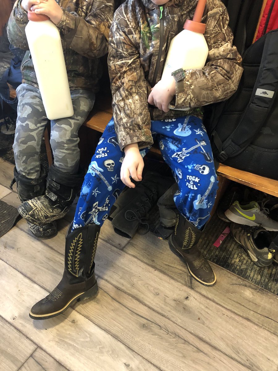 whiskeyjack_AB's tweet photo. Boys are gearing up for morning chores. Fuzzy Jammie’s , calf bottles , camo and cow boy boots 🤣 https://t.co/1RXaYEJ18E