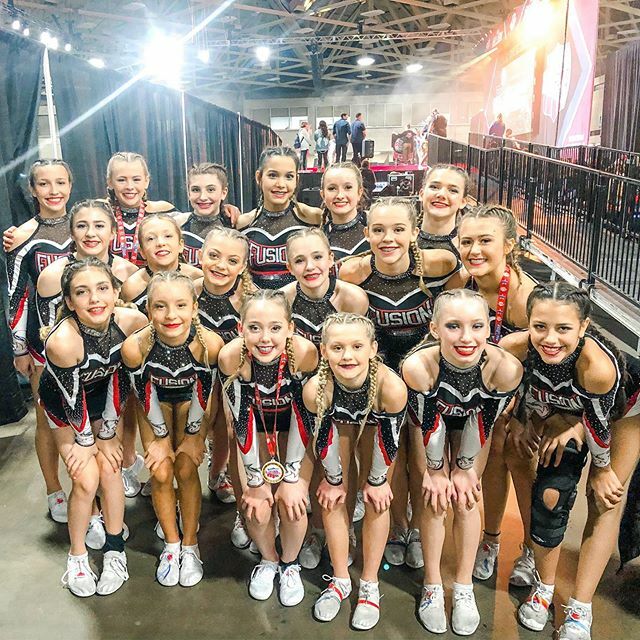 utahfusion's tweet photo. A BIG CONGRATS to FUSION BOMBSHELLS!! You came and conquered at NCA!!! We are SO PROUD of you!!! Loved seeing you on that stage this weekend!!! Here’s to the rest of the season!!!! #fusionswag #fusionbombshells #season13 #13elieveinYOU https://t.co/SW5b19JH7t https://t.co/aPmkmnVvf9