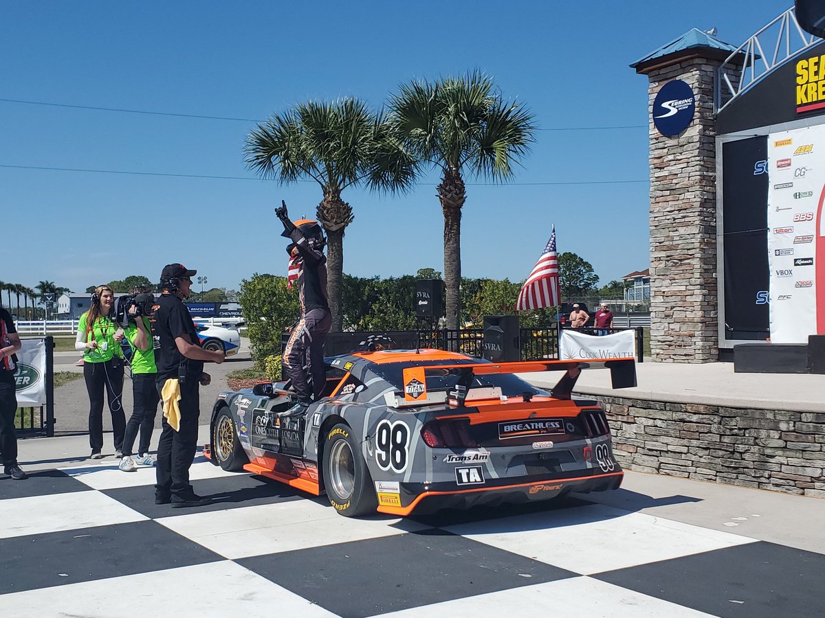 aaron_creed's tweet image. A celebratory @ErnieFrancisJr climbs out of his winning Mustang after leading flag-to-flag.