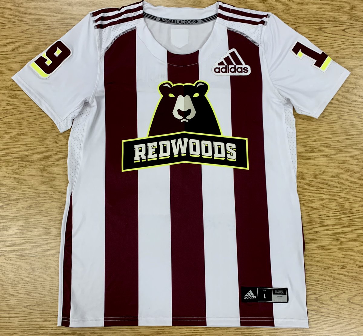 PRFund's tweet photo. Woah look who signed this @PLLRedwoods jersey for the #PRFauction 👀

Shout out to @Julesheningburg, @KyleHarrison18, @jwalters1, @GregBeast32, @MattLandisLax, and the rest of the team for a great season! 🐻🥍

#GoRedwoods #PLL #wetheplayers
#PRFund #shapinglivesthroughsports https://t.co/6OePzKHTw9