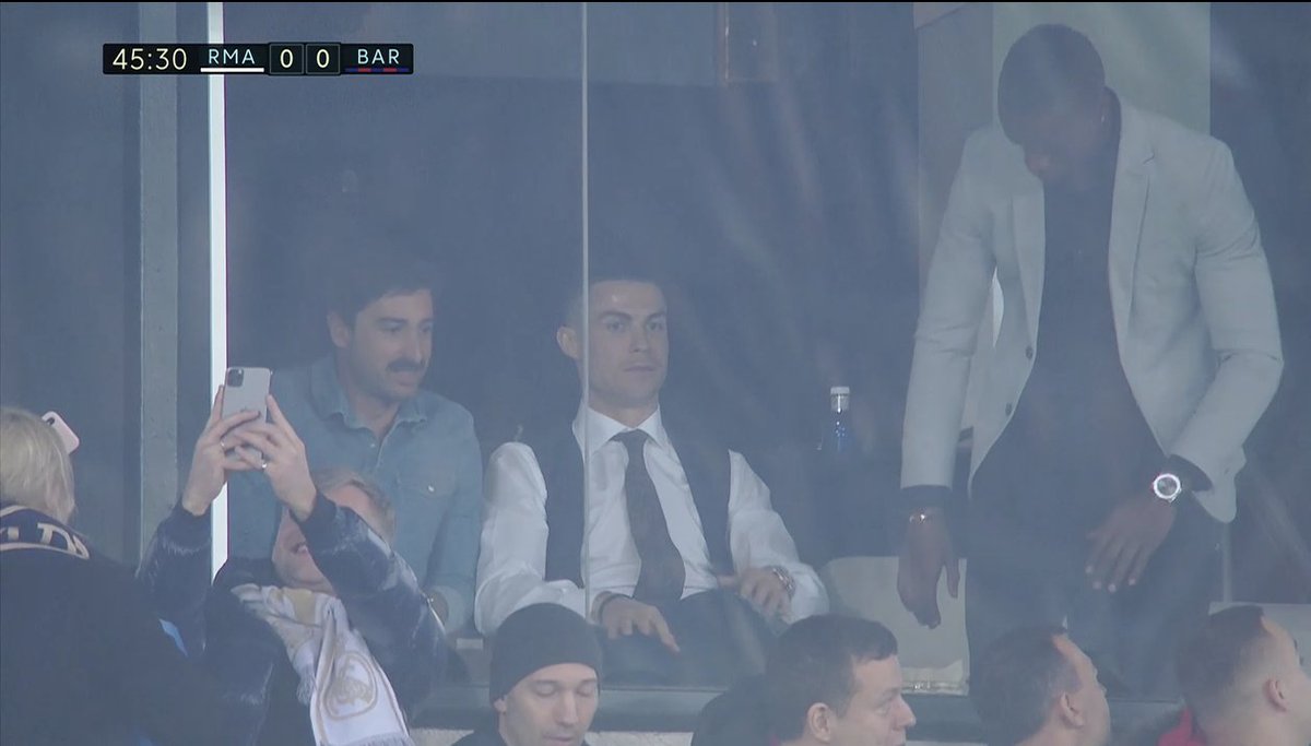 ESPNFC's tweet image. Cristiano Ronaldo is taking in #ElClásico at the Bernabéu 👀