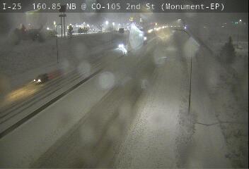 NWSPueblo's tweet photo. KPUX radar at 834 pm continues to indicate heavy snow (2-3 inches/hr) spreading northeast across El Paso County with tail end of band moving out of Teller County attm. CDOT cams indicating slick and snow cover roads along Hwy 115  and I-25 from Fort Carson to Monument. #cowx https://t.co/F0elms2VJm