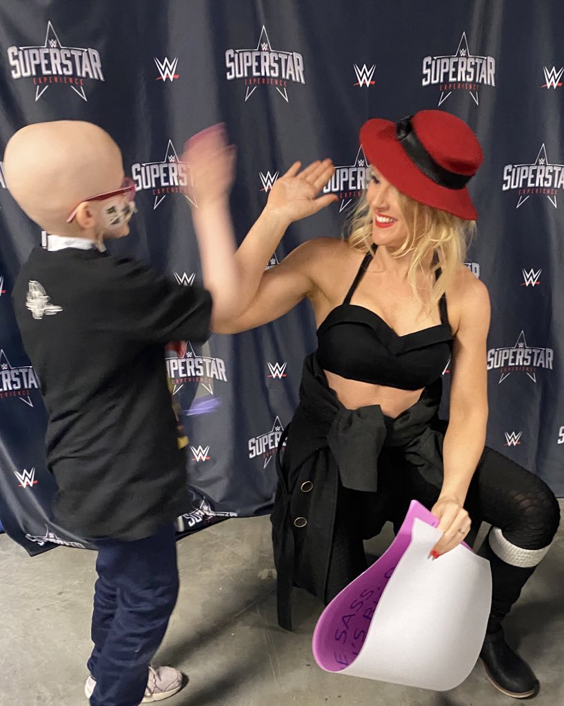 SuperstarWalk's tweet photo. All smiles and high fives when the sassy southern belle @LaceyEvansWWE is in the house at #WWESyracuse 💅👛👒 https://t.co/Vynzb9ERNL
