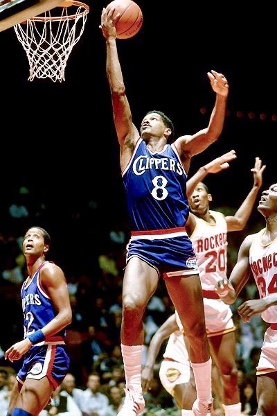 Marques Johnson (#8) briefly played with former UCLA teammate Jamaal Wilkes (#52) on the Clippers. Wilkes, a three-time  #NBA   Champion, played 13 games for the Clippers in 1985 before unexpectedly announcing his retirement.