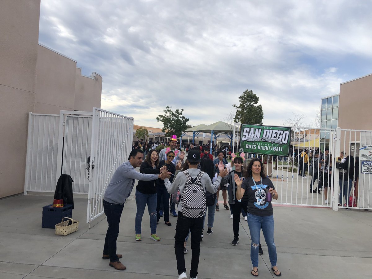 Welcoming students during our “Hi 5” Friday morning.  This time our ELD department and learning center joined in.
