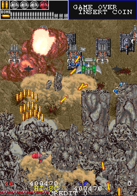 岩塊をふっ飛ばし、味方機をなぎ払い、砂塵を巻き上げて出現するガンクルーザ。兵器的にはキャタピラーで移動する車輌だが、最早“艦（ふね）”といった風格を持つ超大型兵器。何らかのエネルギーを充填し塊として放つ主砲を持ち、巨大な砲とリボルバーを複数装備している。ワイルドリザードの依り代。