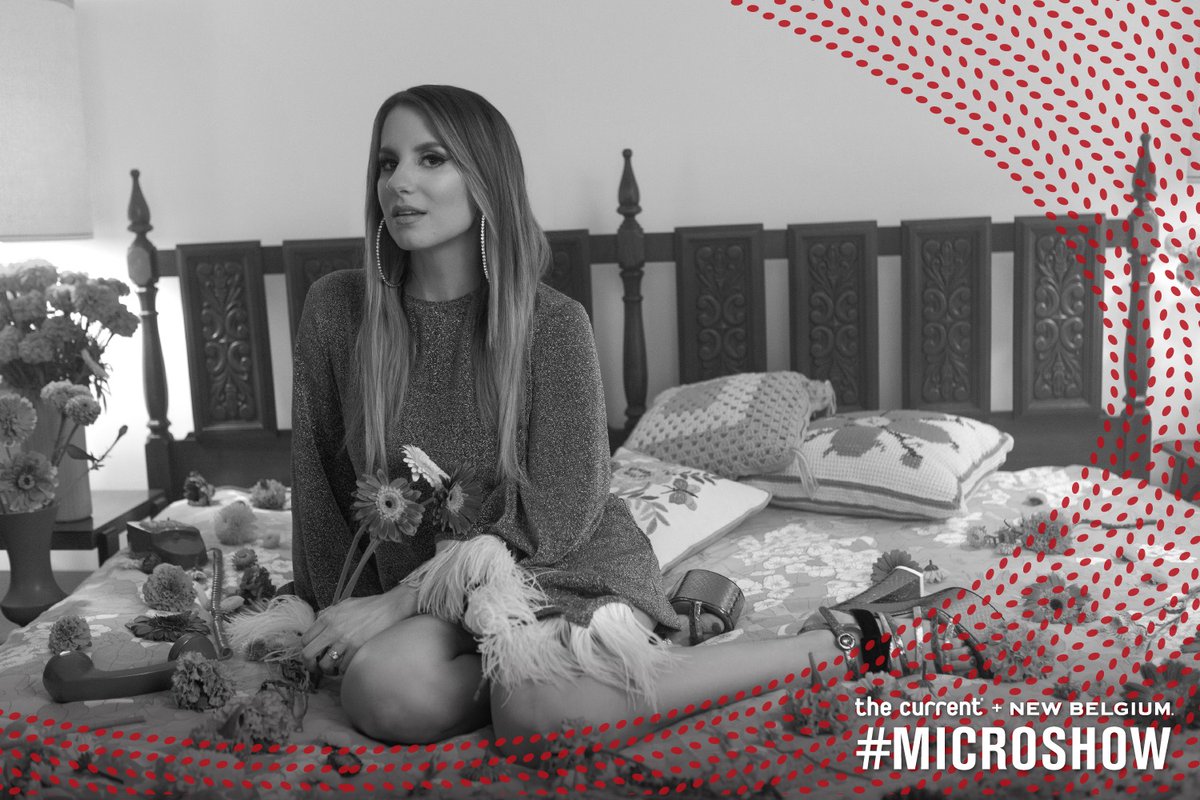 Graphic with Caitlyn Smith sitting on bed