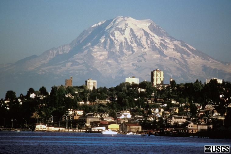 USGS's tweet photo. Mount Rainier Natโl Park was established #onthisday in 1899. Its namesake, Mount Rainier, is the highest peak in the Cascade Range at just over 14,400 ft. Learn more here: https://t.co/0SgcxnE8QC #magmamonday https://t.co/Nv4cNEziEH