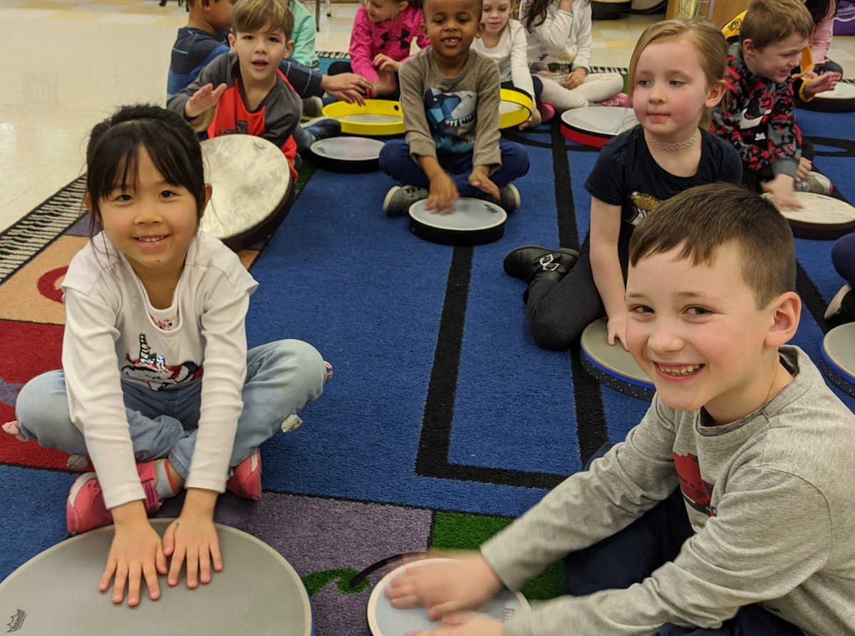 MrsFrasermusic's tweet photo. Look at the smiling kindergartners in Ms. Ternullo's class!  We played Hand Drums today. We have enough hand drums in class for everyone to get one. What a LOUD and FUN music class!  @MrsTernullo https://t.co/yRkNfDwBm3