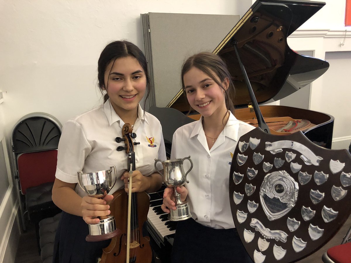 SES_Music's tweet photo. We are very proud of these Stamford High School girls who won the Adjudicator’s cup for the best performance of the music festival, and the Music Festival Cup for the most promising musician, and the Festival Concert Shield for the best performance of the concert. @SpedeNews https://t.co/06SLQZyrun