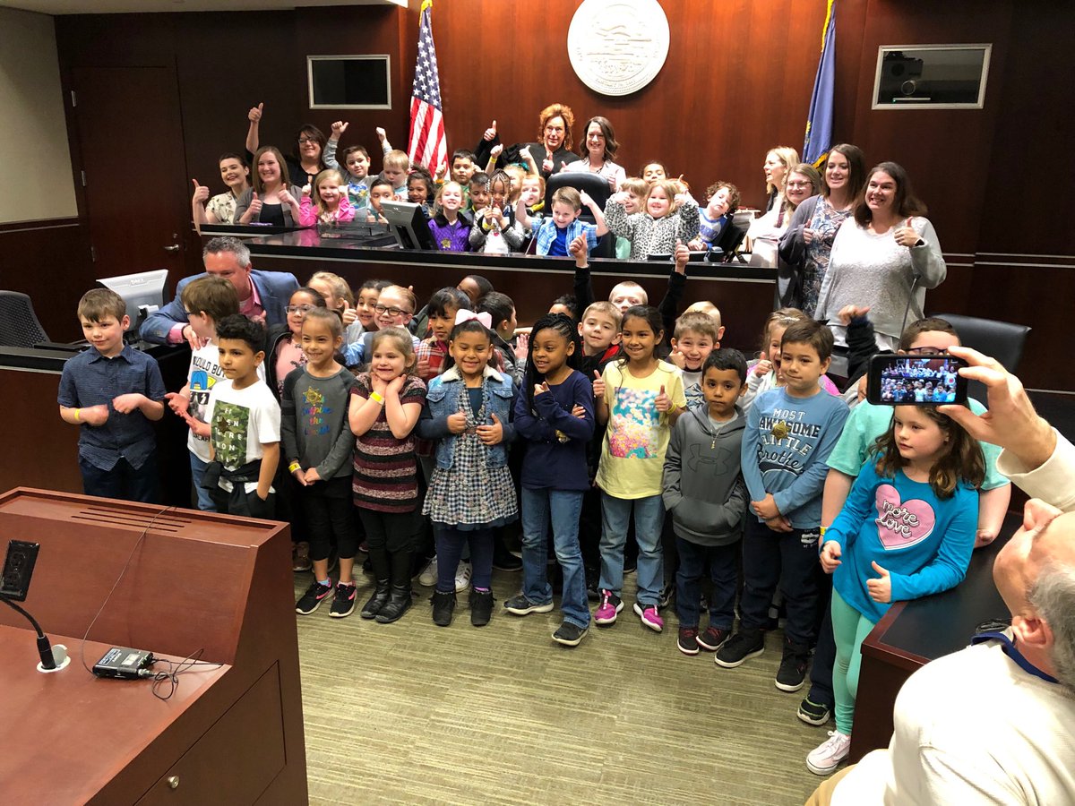 Who says Mondays are no fun? That’s Tyler holding court this morning after Judge Kathleen Sloan approved his adoption with about 40 of his 1st grade pals on hand to celebrate