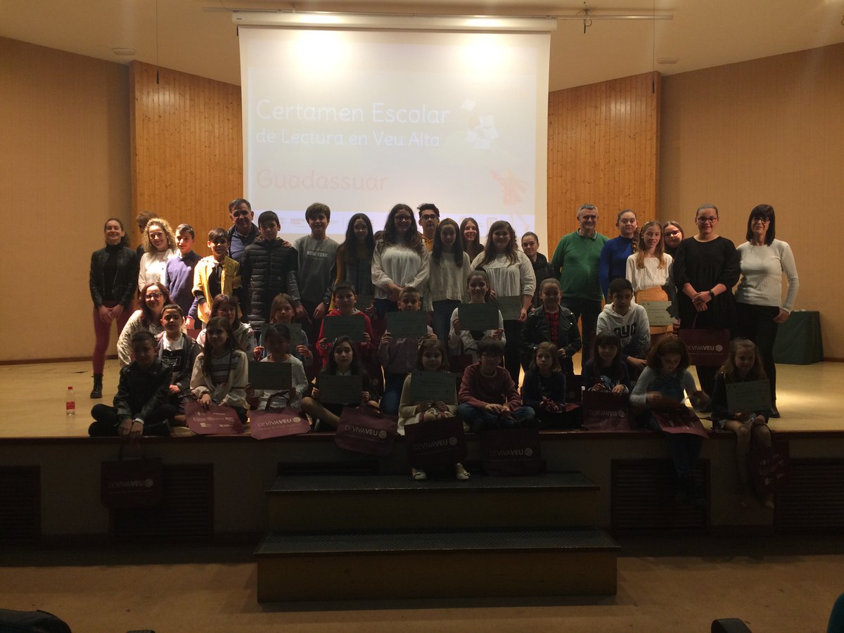 🧐 Guadassuar consolida la 5a edició del Certamen Escolar de Lectura en Veu Alta de De Viva Veu 👉 devivaveu.es/guadassuar-con…. <a href="/AjuntGuadassuar/">Ajuntament de Guadassuar</a> <a href="/guadassuarbib/">Biblioteca Guadassuar</a> <a href="/IESGUADASSUAR/">IES GUADASSUAR</a> <a href="/FundacioFull/">Fundació FULL</a> <a href="/caixapopular/">Caixa Popular</a> <a href="/FeetsProjectes/">FeetsGestióProjectes</a>