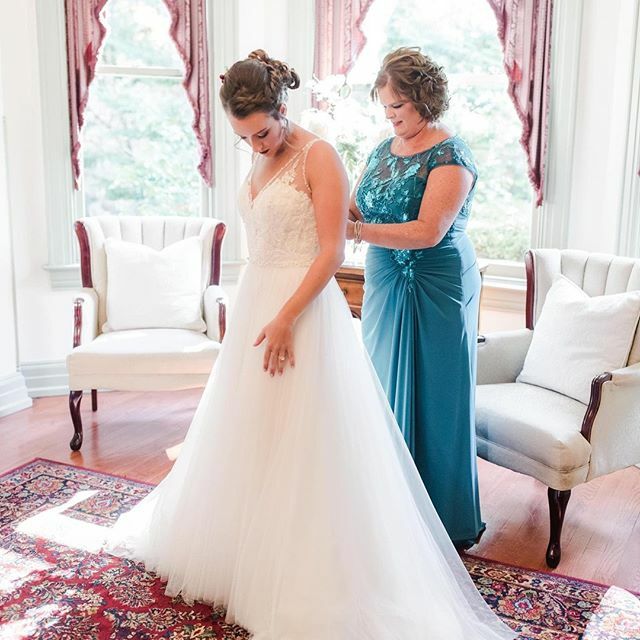 Getting ready photos give us all the warm and fuzzy feels🥰 Style J195010 | 🛍: <a href="/tayloredforyou/">Taylored for You</a> | 📸: @ashleezimmermanphotography
.
.
. bit.ly/3cqTVao