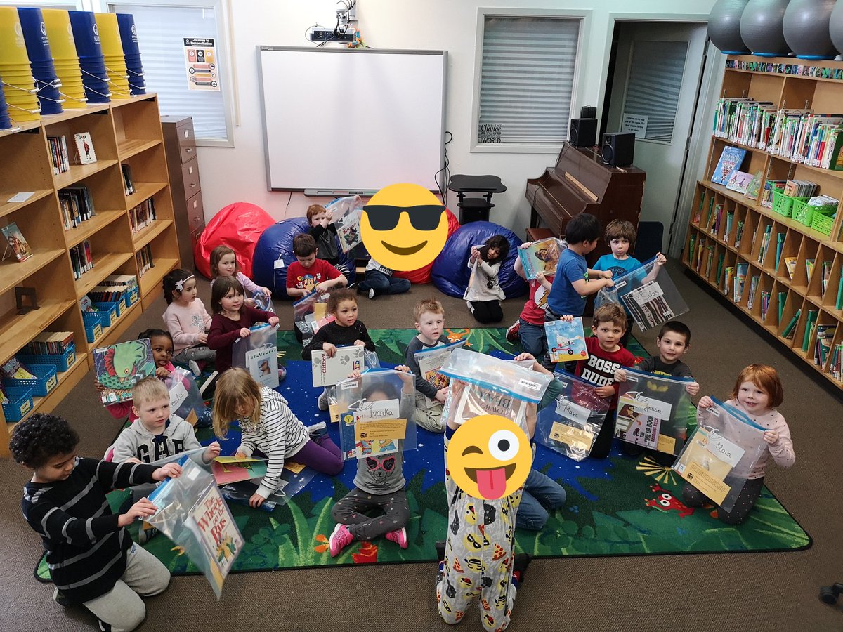 Mister_McLean's tweet photo. Some super excited friends trying our hand at taking out books from the library! We were so excited to be able to choose our own stories to borrow! 😁📚 @OLPeaceOCSB #ReadersAtWork https://t.co/YCelMDwrzT