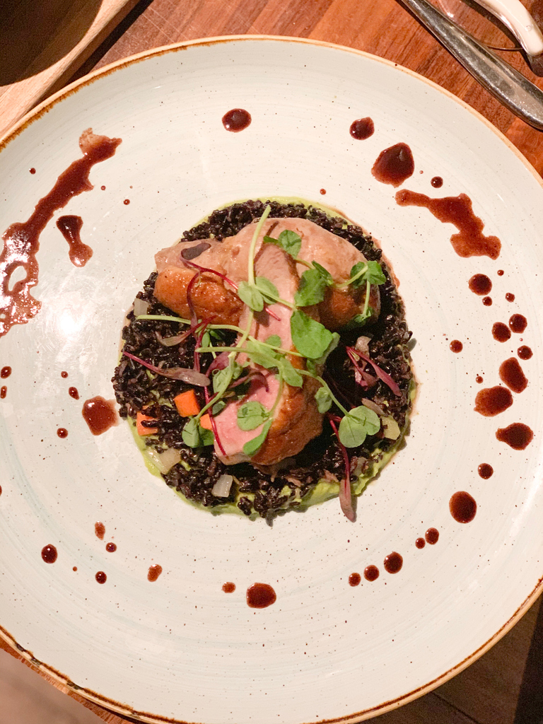 Our duck is pan-roasted and served with a silky pea puree, forbidden rice for texture and demi-glace. Don't miss out on this dish!⁠