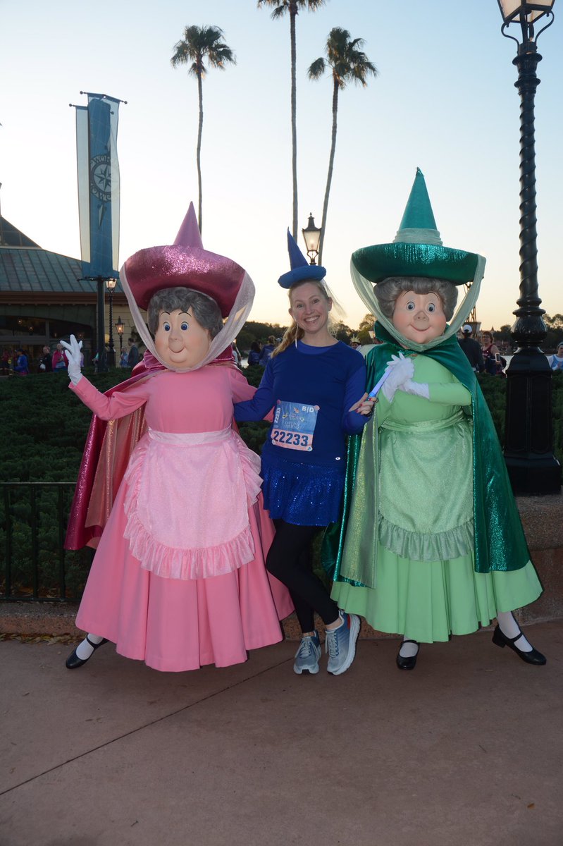OHDisneyMom's tweet photo. My favorite @DisneyPhotoPass picture from the #Enchanted10k during #PrincessHalf weekend! Flora and Fauna were so happy to be reunited with Merryweather! #SparkleAthletic https://t.co/7248h0bvhK
