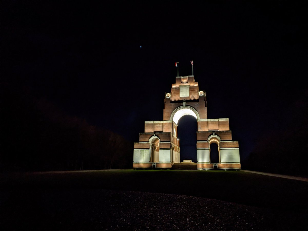 CWGC's tweet photo. RT @SeeJayAnderson: Well, that was a special way to end the day: @CWGC's #Thiepval memorial lit up at night. I could've sworn the lights made it taller... https://t.co/WW9XfUdiE6