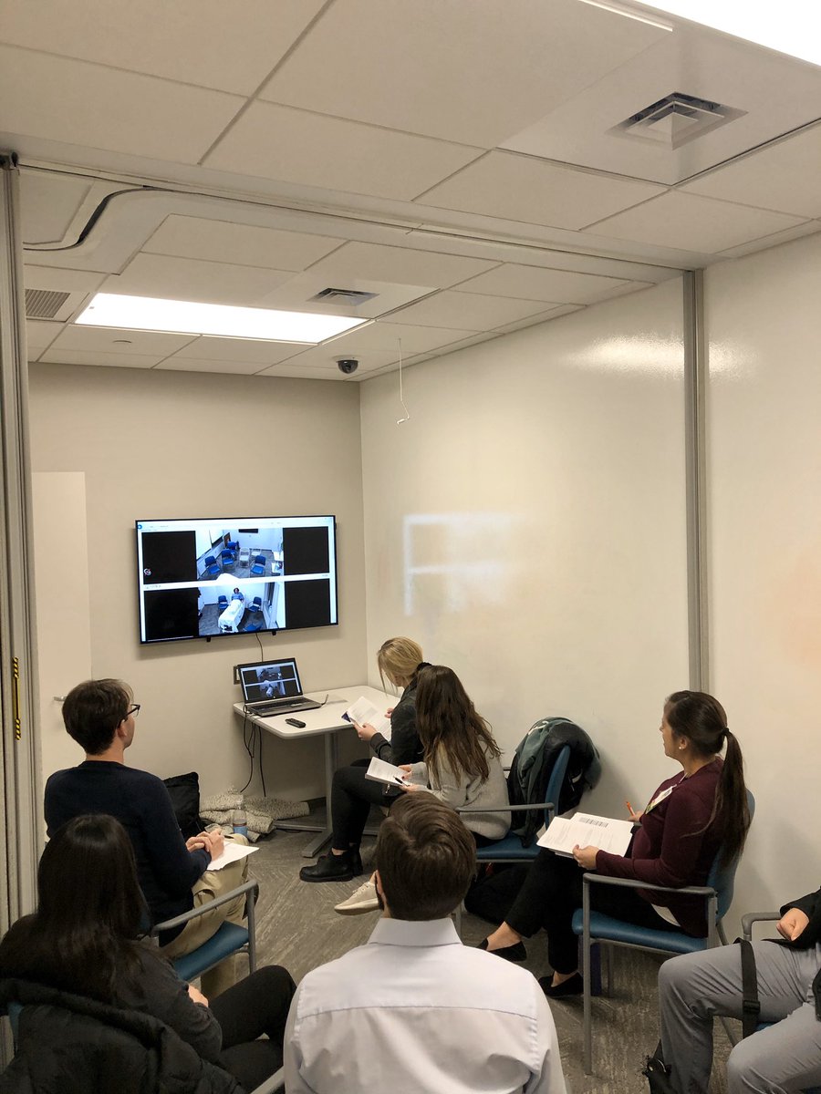 IHPProvost's tweet photo. Here students are in the observation room watching their fellow team members engage in a sim and interact with a standardized patient. After the sim, they will all reconvene for a facilitated debrief with faculty members and peer facilitators. #IPE #IHPIMPACTPractice https://t.co/dhX4fEcc5E
