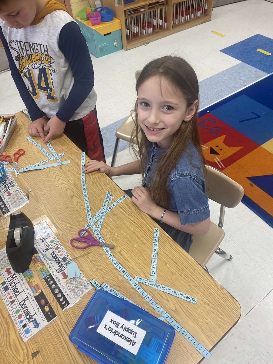 Mathematicians at work, relating the 120 chart to a loooong number line!