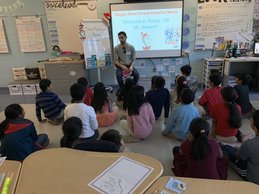 MissTunnell's tweet photo. Happy Read Across America! We had a reading filled day with Woodbrook Masked Reader, two guest readers, and our hallway reading @WoodbrookSchool https://t.co/RVy6HO2qrT
