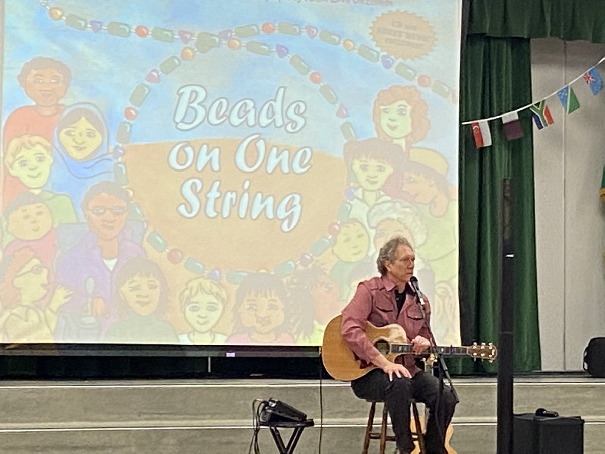 EPS_MonroeES's tweet photo. Monroe welcomed Dennis Warner, author of #BeadsOnOneString to share songs and stories of inclusivity and kindness. @EPS_Central https://t.co/fIPam74v42