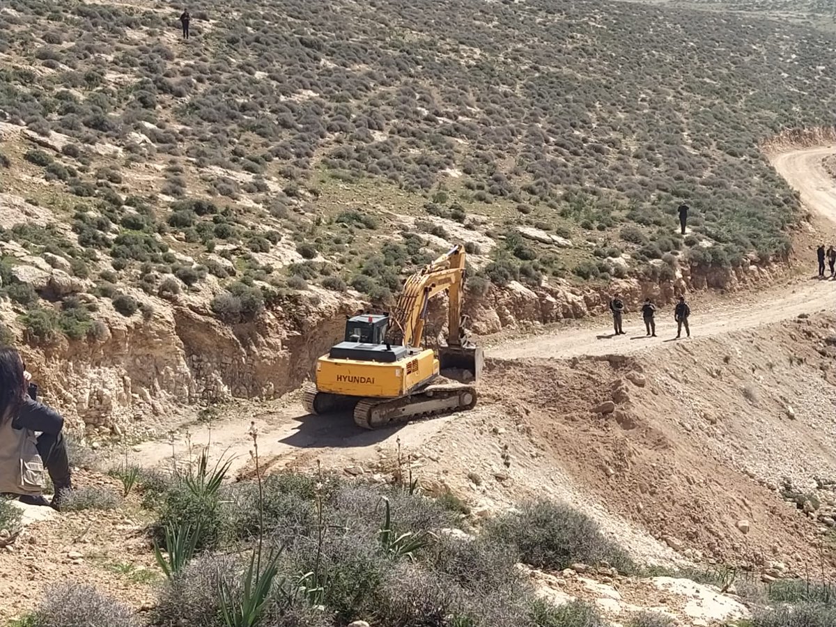 TogetherTuwani's tweet photo. HAPPENING #NOW: Israeli bulldozers are demolishing a Palestinian road in the #SouthHebronHills. The road connects the villages of the Massafar Yatta area to the city of Yatta.
#Demolition #Area_C #Palestine https://t.co/KL9wqK0i0N