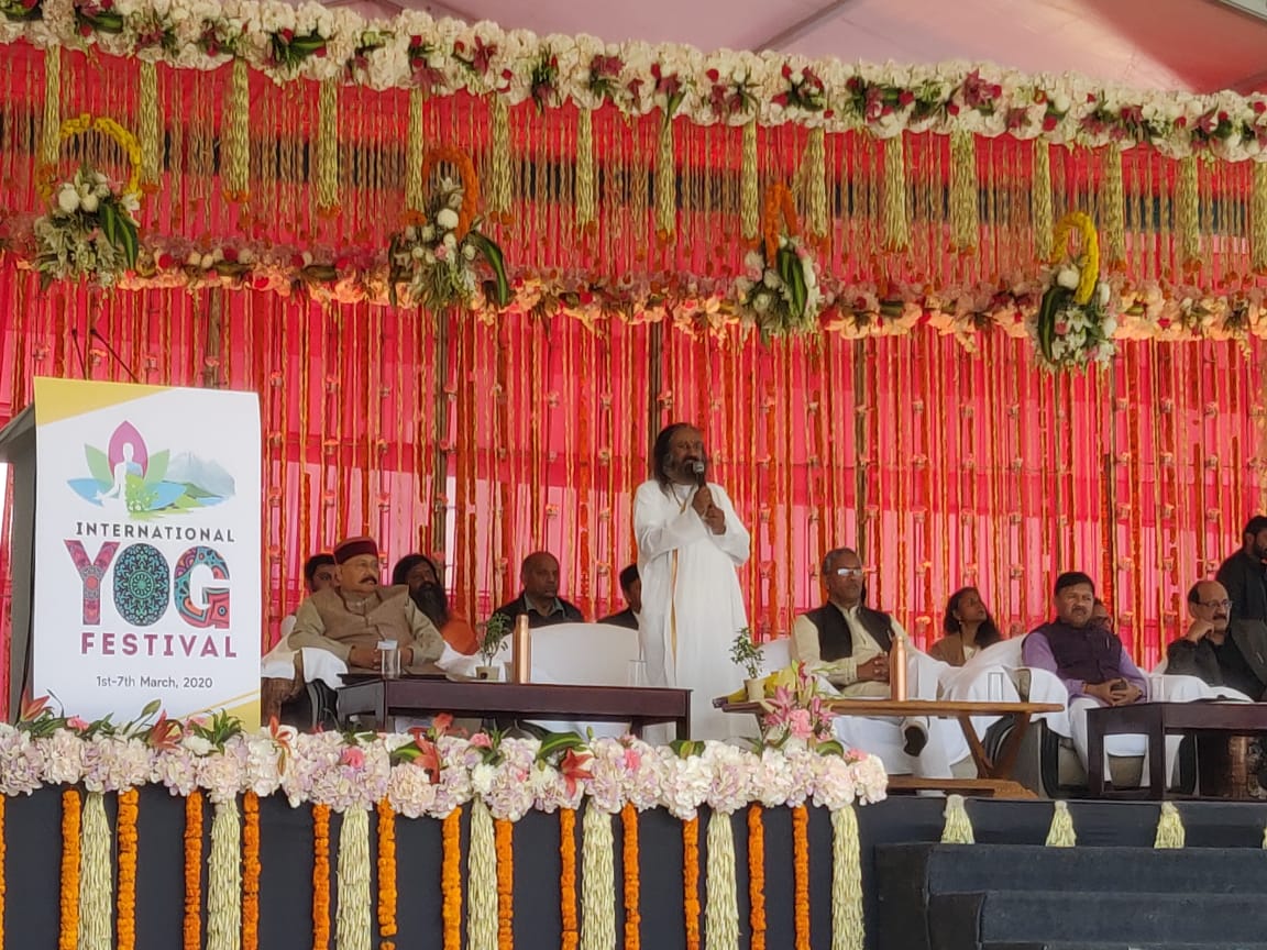 Gurudev's tweet photo. Yoga is not just a set of stretches but an attitude - how you care for Nature, how you connect with people, of all races,cultures &amp; religions. That oneness - with Divinity, with Nature &amp; people - is the real essence of Yoga.

Addressed the International Yog Festival at Rishikesh. https://t.co/mUQEAcgbHw
