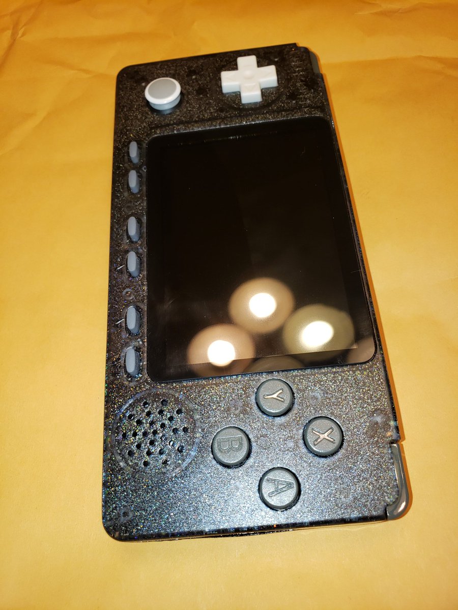 Figment247's tweet photo. @PantslessAaron Here's another one with color changing "Lame Flake" Tamiya paint. Also installed an authentic white Psvita thumb stick and a white D-pad https://t.co/Kx0NKgZkx9