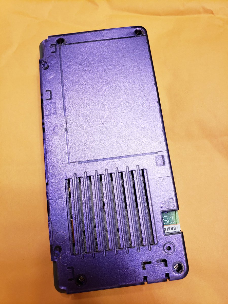 Figment247's tweet photo. My Odroid Go Advance handhelds, finished them both off with Tamiya paint. One is "Metallic Purple" and the other is called "Lame Flake" which changes colors in the light at certain angles.
#odroid #Retro #handheld #games https://t.co/Gf0mhdpp2q