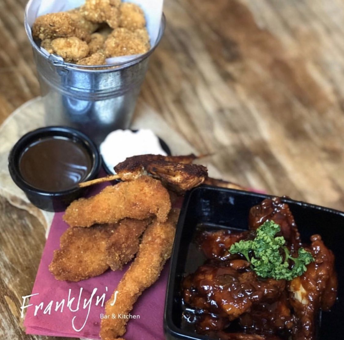 Our famous Chicken Platter! Southern-fried chicken goujons, popcorn chicken, sticky buffalo wings and Piri-Piri skewers with home-made chicken gravy and garlic mayonnaise dipping pots. ⠀
.⠀
#fbk #Chicken #newmenu #Heswall #Wirral #sharingplatter #southernfried #chickenplatter