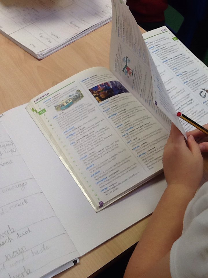 Y3OPS's tweet image. Mrs Sprowell&apos;s guided reading group have come across some tricky new vocabulary in their extract from &apos;Alice in Wonderland&apos; and are using the dictionaries to try and find the definitions #WorldBookDay2020  #dictionaryskills #readingandlearning