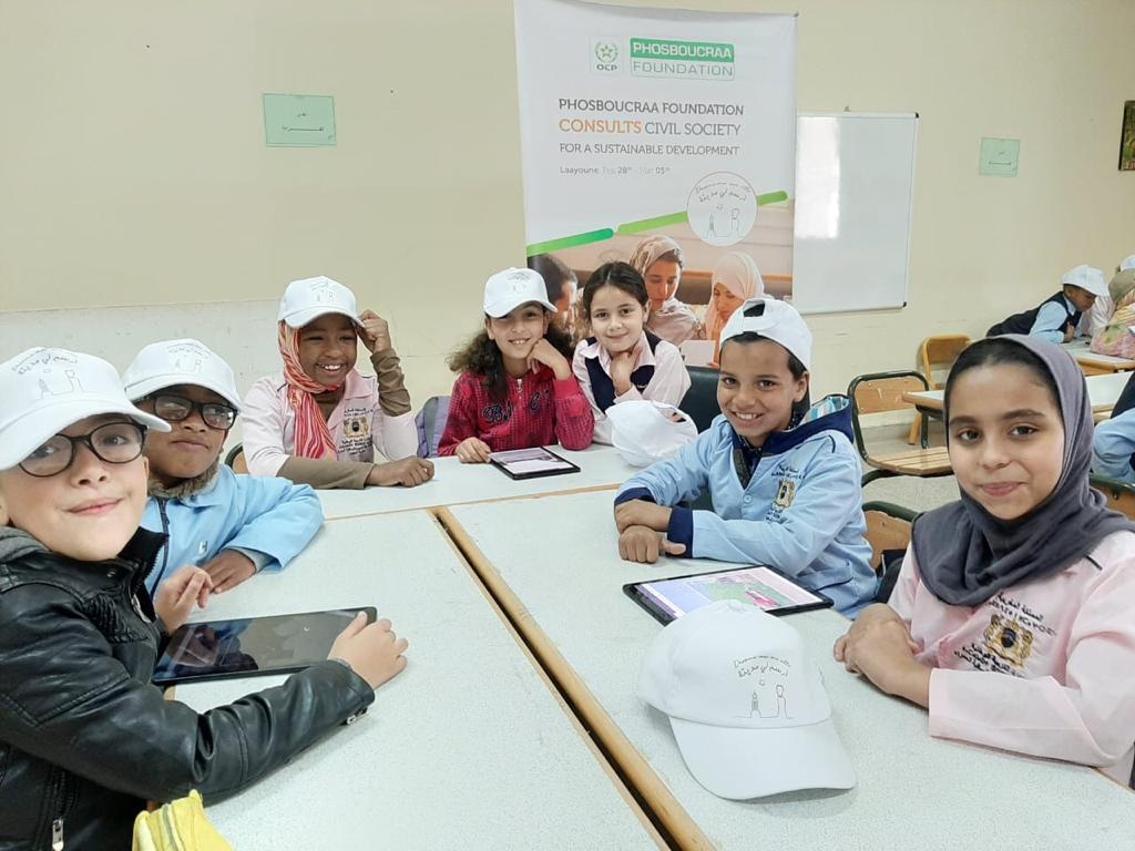 Phos_Foundation's tweet photo. Day-5 #DMUV 2nd edition. We are now consulting toddlers from Foum El Oued school in #Laayoune on how to improve their city. They are very happy to be involved in the development of their public spaces. #morocco #urbandevelopment #empoweringcommunities https://t.co/xLOMC7DOsT