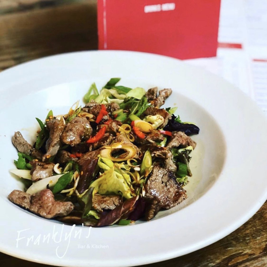 Oriental Steak Salad - Strips of medium rib-eye steak on a bed of fresh leaves, drizzled in a spicy thai dressing. #steaksalad #oriental #steak #ribeye #freshleaves #spicythai #wirral #heswall #fbk #franklyns